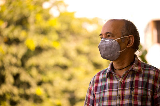 istock Old senior wears a mask to protect against viruses 1278734850