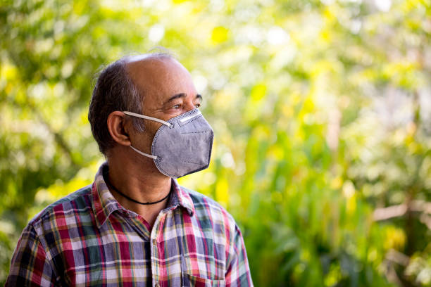 istock Old senior wears a mask to protect against viruses 1278735199