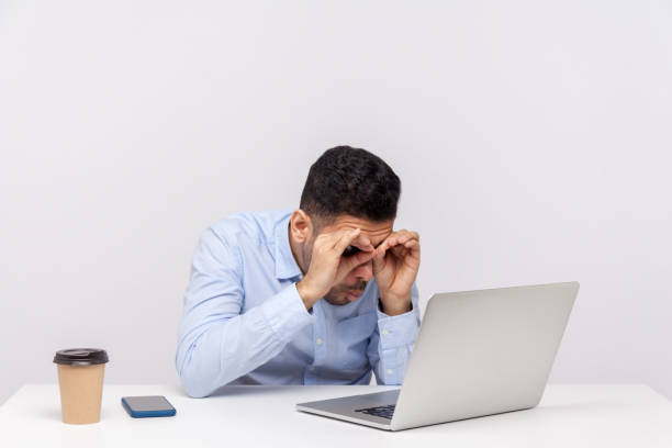 istock Amazed male office employee looking at laptop screen through binoculars hand gesture expressing big surprise 1278743531