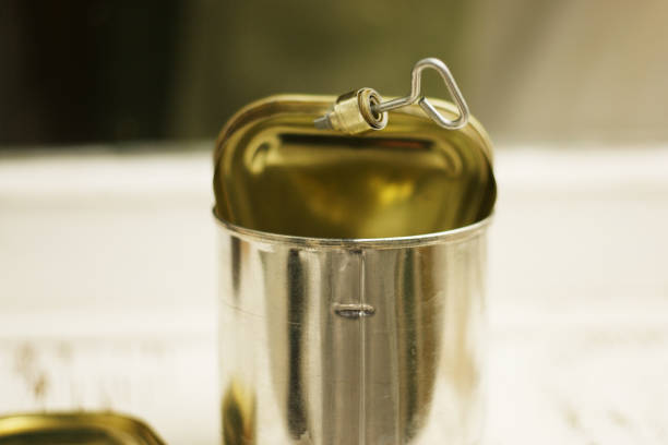 istock tin can key. old tin can with a used key on an old rustic window 1278746047