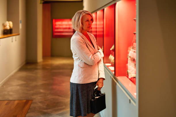 istock Mature woman visiting Art Museum 1278746052