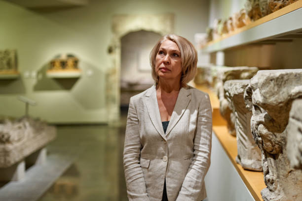 istock Woman exploring medieval expositions in museum 1278746081