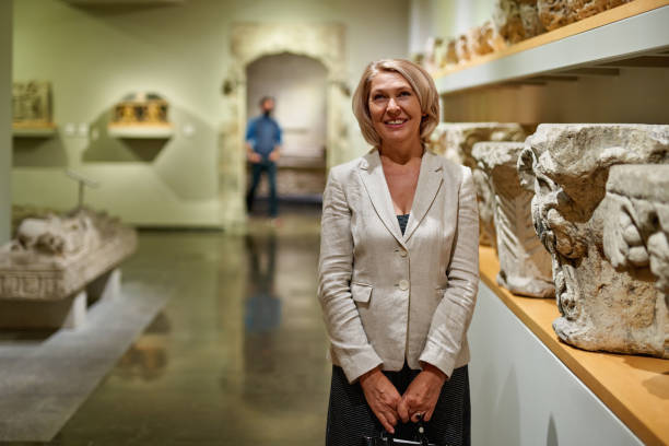 Woman exploring medieval expositions in museum