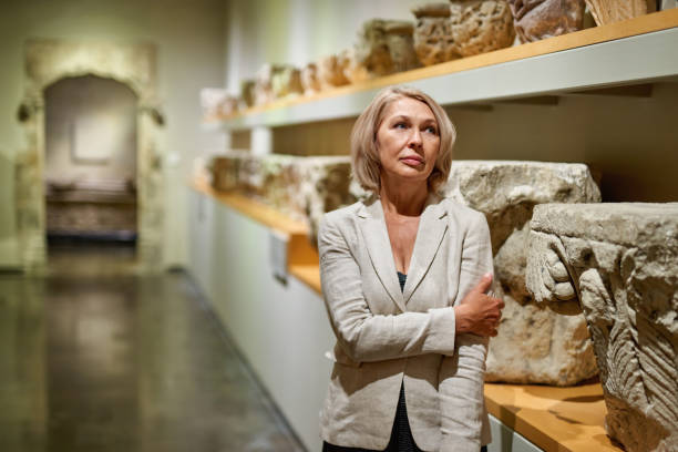 istock Woman exploring medieval expositions in museum 1278746147