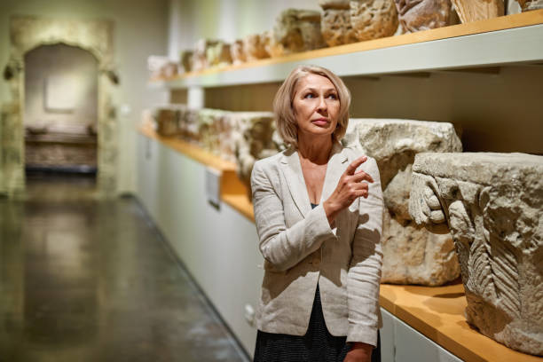 istock Woman exploring medieval expositions in museum 1278746175