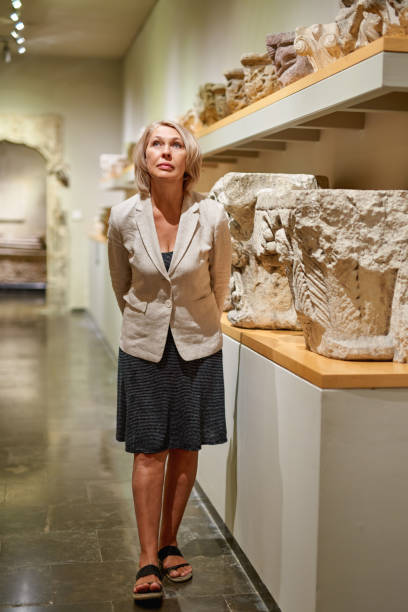istock Woman exploring medieval expositions in museum 1278746207