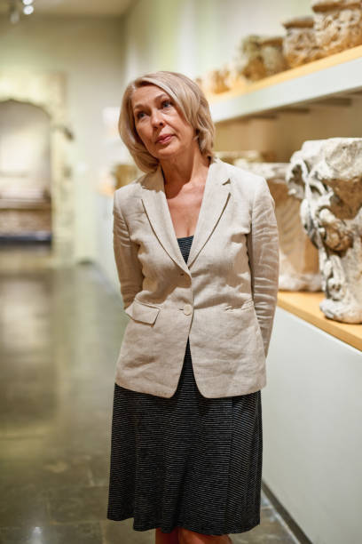 istock Woman exploring medieval expositions in museum 1278746231