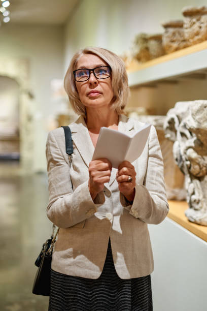 istock Woman exploring medieval expositions in museum 1278746293