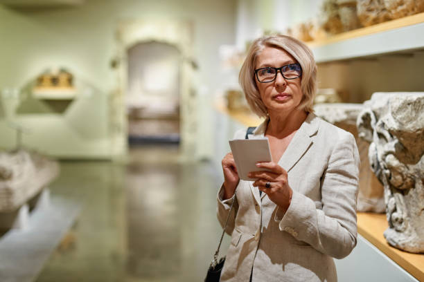 istock Woman exploring medieval expositions in museum 1278746333