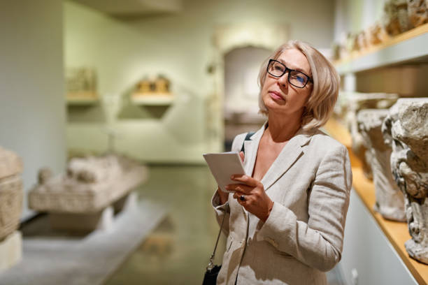 istock Woman exploring medieval expositions in museum 1278746360