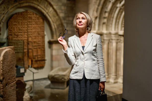istock Woman exploring medieval expositions in museum 1278747078