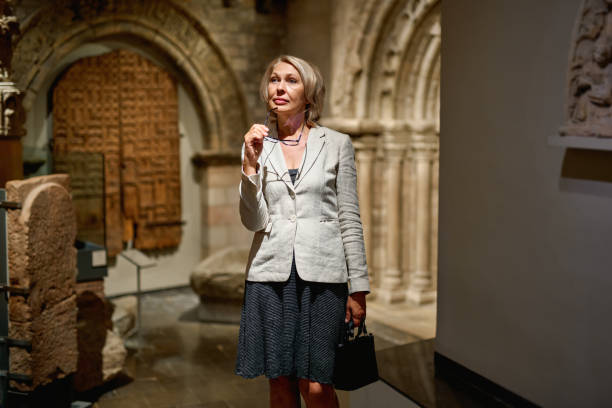 istock Woman exploring medieval expositions in museum 1278747082
