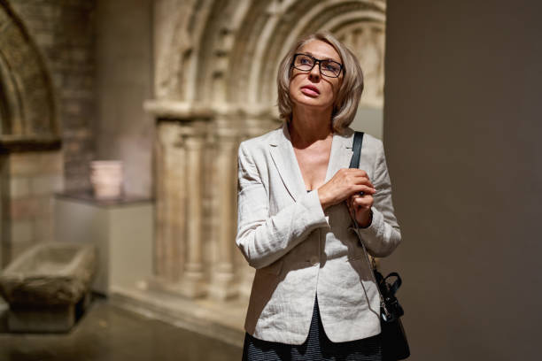 istock Mature woman visiting antique museum 1278747117