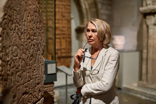 istock Woman exploring medieval expositions in museum 1278747138
