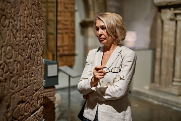 istock Woman exploring medieval expositions in museum 1278747153