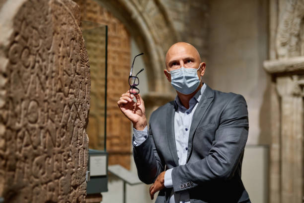 istock visit museum in an antivirus mask 1278747174