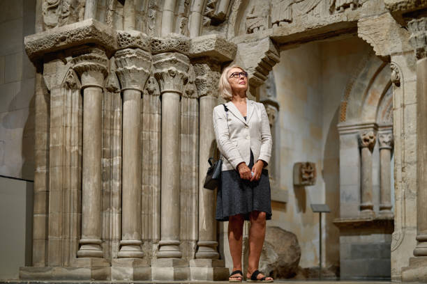 istock Woman exploring medieval expositions in museum 1278747201