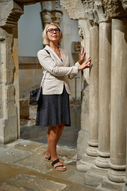istock Woman exploring medieval expositions in museum 1278747221