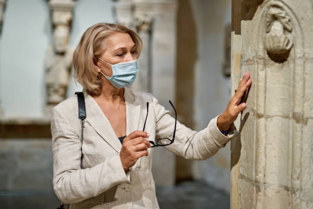 istock Woman exploring medieval expositions in museum 1278747233