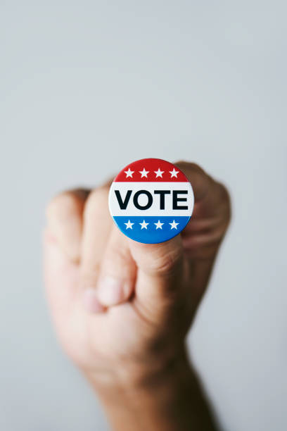 istock man with a vote badge for the US election 1278750701