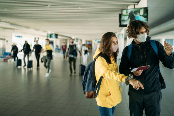 istock Father and daughter at flight terminal 1278750903