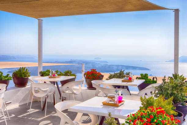 istock Snug Open Terace Cafe in Thira on Santorini Island in Greece. Horizontal Image 1278753760