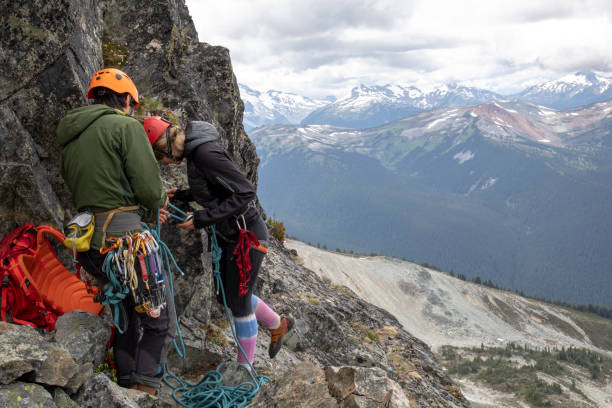 istock Mountaineers prepare to climb steep rock face 1278754663