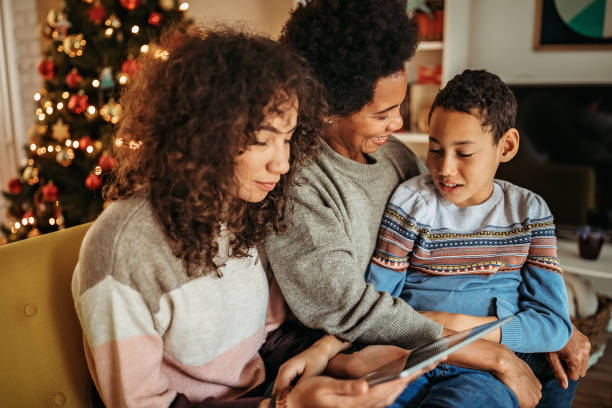 istock Family having a video call during Christmas time 1278755146