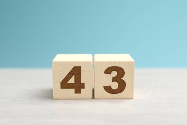 istock Wooden toy blocks forming the number 43. 1278756559