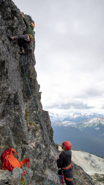 istock Mountaineer climbs up mountain ridge 1278756656