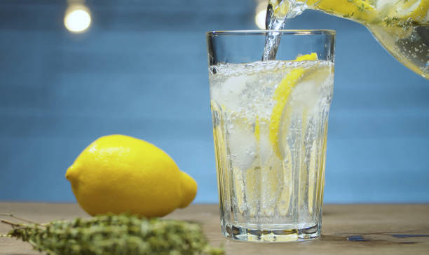 istock Lemonade pouring into a glass 1278757866