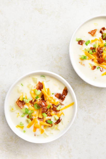 istock Potato creamy soup with bacon and cheddar cheese 1278758089