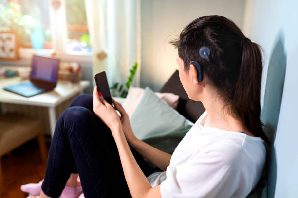istock Beautiful young woman with cochlear implant 1278760521