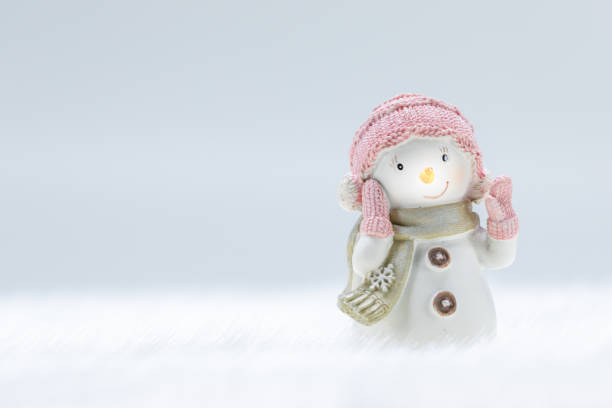 istock Snowman toy on winter background 1278760843