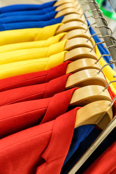 istock Multicolored men's jackets on rack in a shop 1278761056
