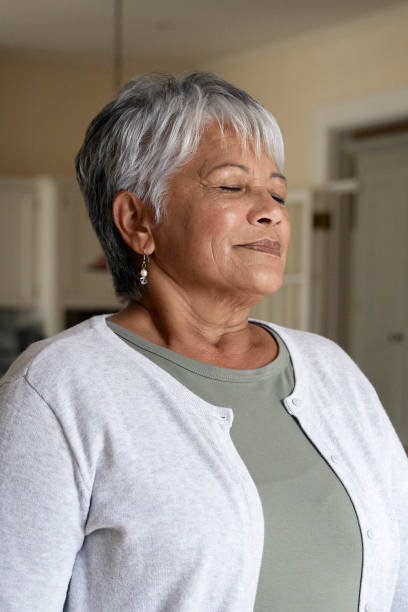istock Senior woman taking a deep breath 1278761800
