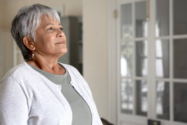 Senior woman taking a deep breath