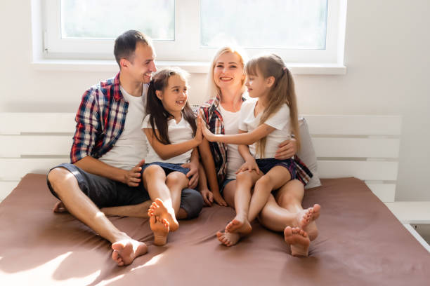 istock Young family being playful at home 1278763352