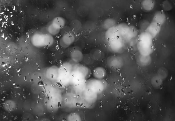 Black and white concept of rain drops background.
