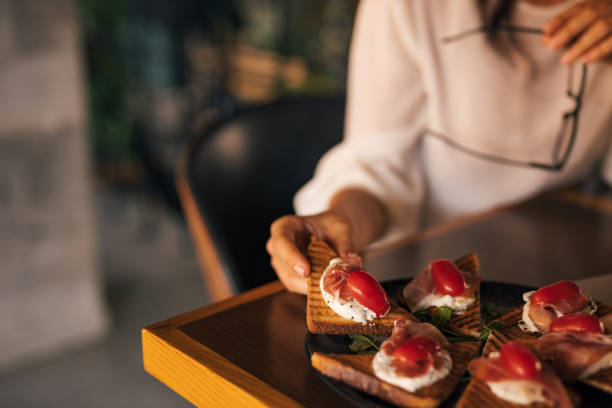 istock Toast with sour cream, ham and tomato. 1278765004