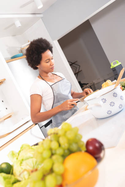 istock Woman cooking in domestic kitchen 1278771239