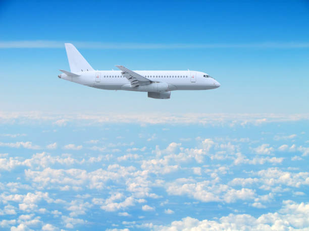istock large white passenger plane flies high above the clouds 1278772149