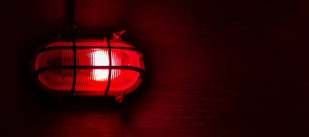 red lantern on the dark red lantern, alarm in a bunker, light in shelter war zone stock pictures, royalty-free photos & images