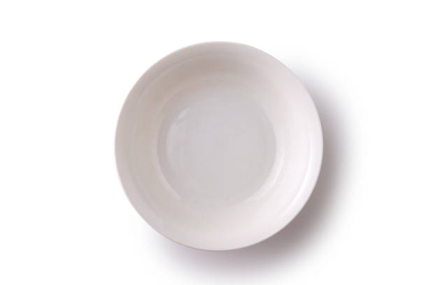 istock Overhead shot of white dinner plate on white background 1278774056
