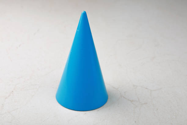 Pyramid children's toy made of white rings on a white background