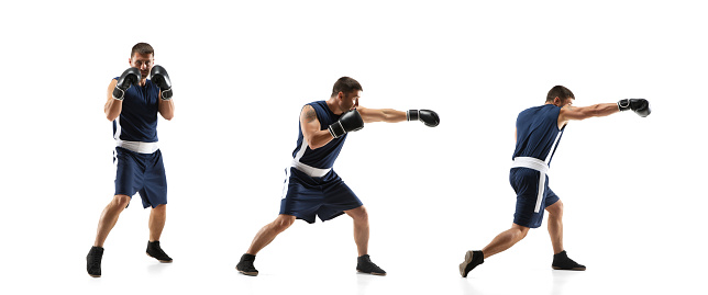Fighter. Young professional boxer training in action, motion of step-to-step kicking isolated on white background. Concept of sport, movement, energy and dynamic, healthy lifestyle. Flyer.
