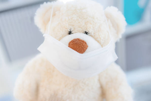 istock Medical mask on teddy bear 1278776761