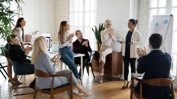 istock Indian female tea leader make whiteboard presentation in office 1278778849