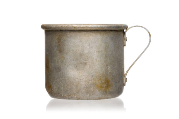 istock Vintage aluminum mug isolated on white background. 1278779014