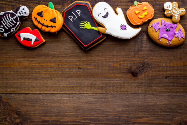 istock Halloween holiday background with cookies, top view 1278788939